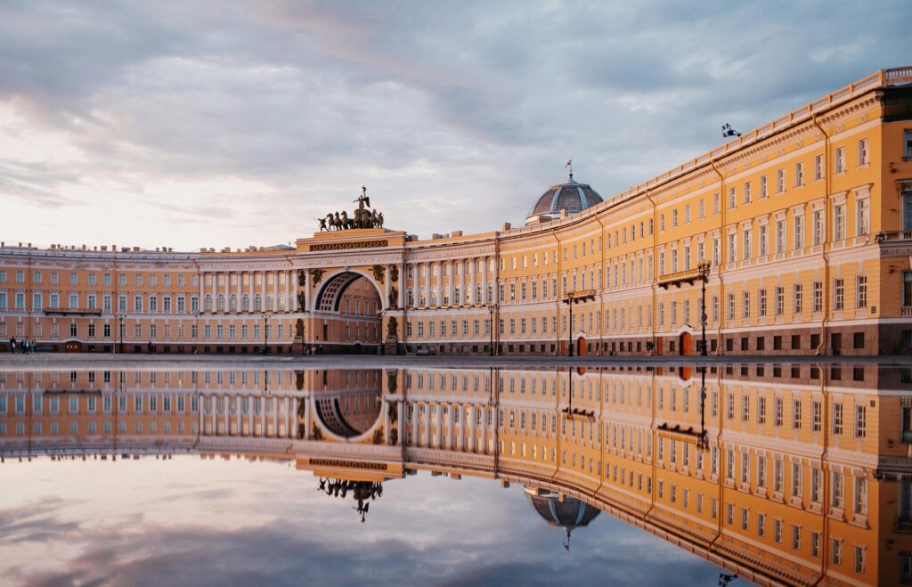 Stunning reflection of the General Staff Building at Palace Square, St. Petersburg, capturing architectural elegance.